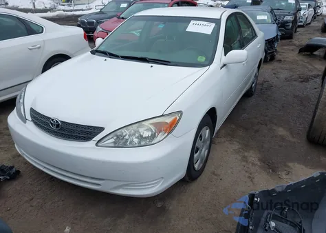 2003 Toyota Camry Le z USA, uszkodzony, nr VIN 4T1BE32K13U134101